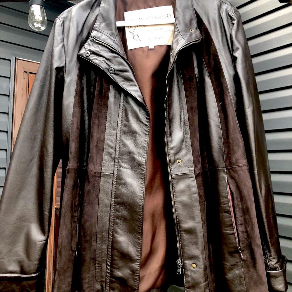 Ladies Micheal Angelo leather and suade.